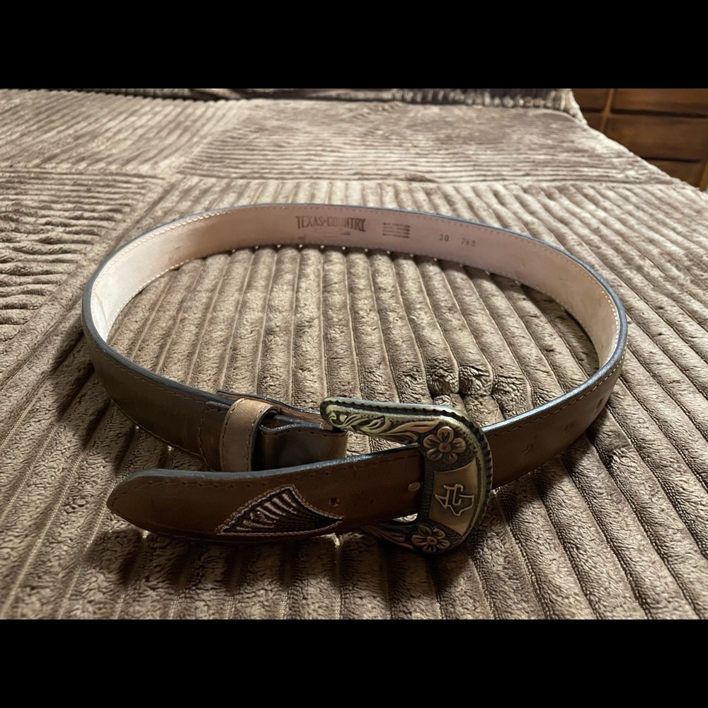 Women’s country belt. Hand made with boots designs. Brand new. Size 30.